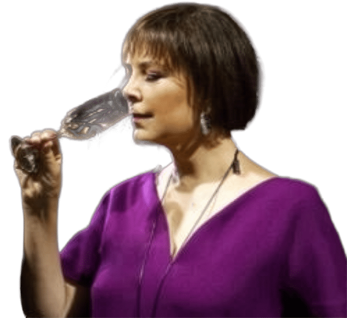 Acerca de 11 Ana María Romero Mena drinking a glass of tequila
