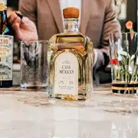 Home 10 Bottle of Casa Mexico Reposado Tequila next to some glassware