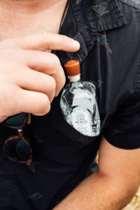 How to Host a Tequila Tasting 5 Casa México tequila bottle displayed for a tasting, showing the clear color of the spirit ready for guided evaluation